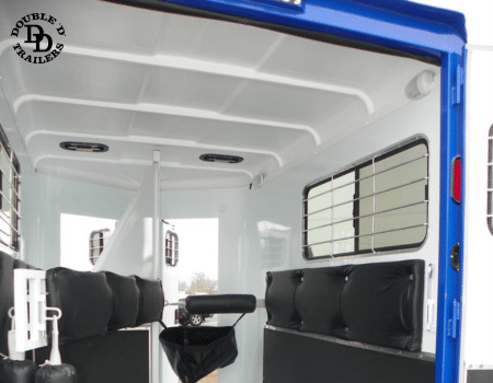 SafeBump roof system in a horse trailer, featuring a flexible, seamless, and leak-proof design for improved safety and temperature control.